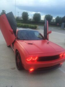 Eric Ebron's modified red-colored Dodge Challenger