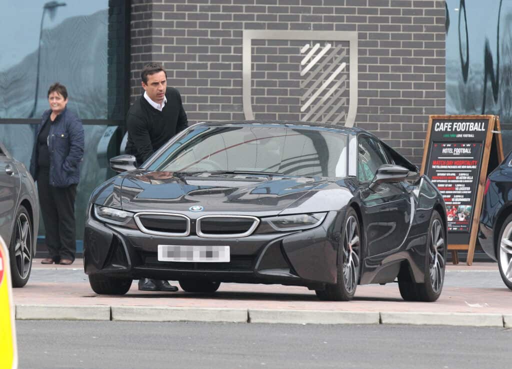 Gary Neville on the way to his BMW Car.