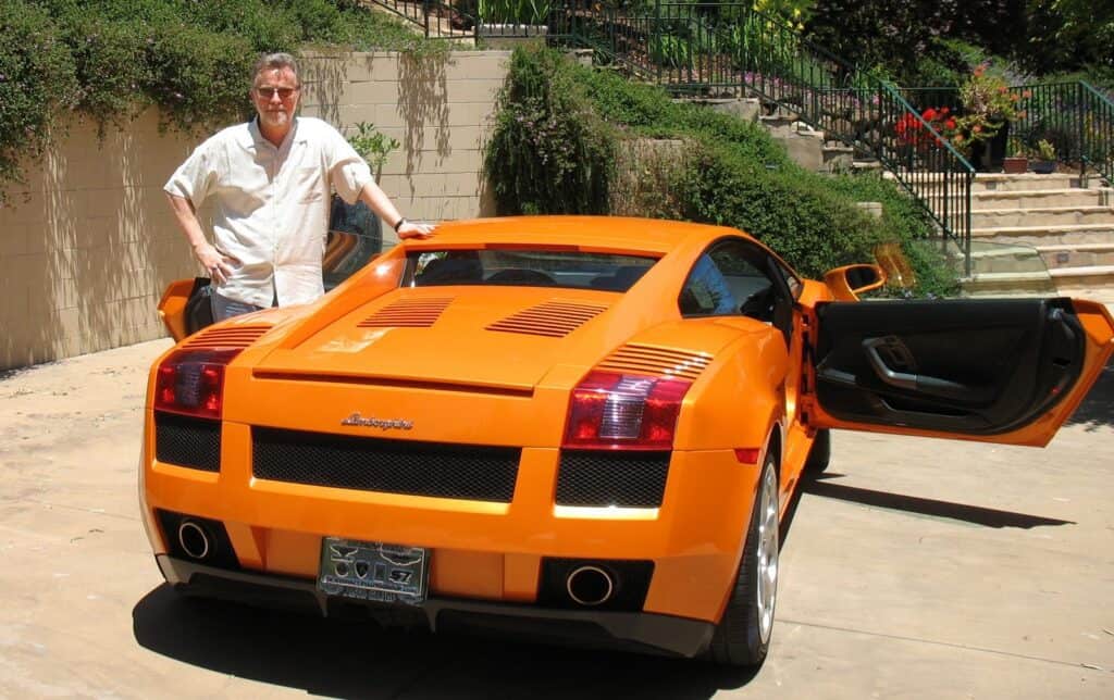 Jeremy Clarkson posing with his Lamborghini Gallardo Spyder.