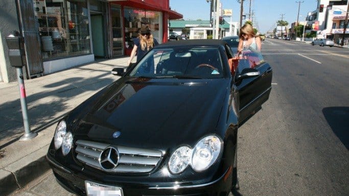 Lauren Conrad in her black Mercedes-Benz CLK 350 convertible. 