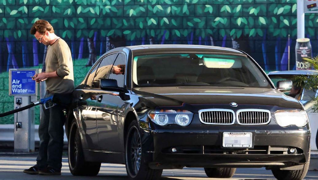 Matthew Perry Fueling BMW