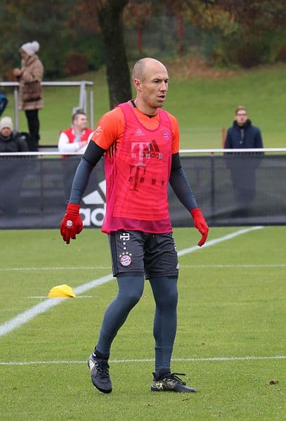Arjen Robben wearing Adidas shoes.