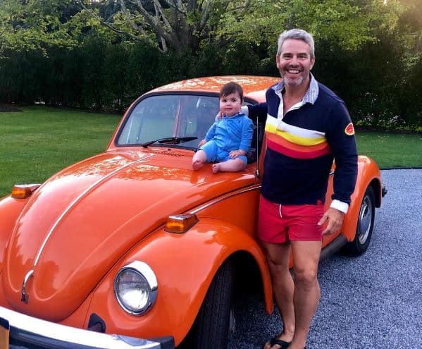 Cohen and son on VW Beetle