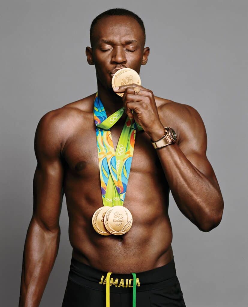 Usain Bolt winning Medals