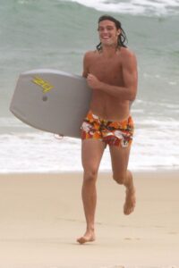 Carroll enjoying surfing in RIo