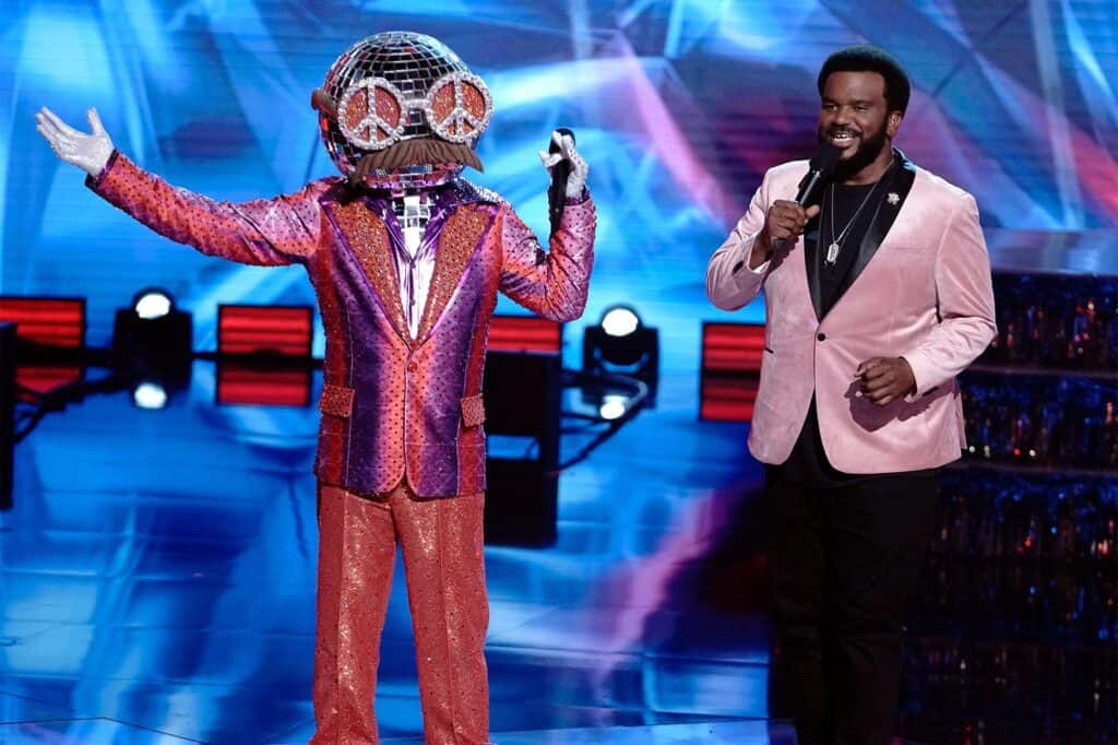 Craig Robinson hosting the reality TV show, The Masked Singer.