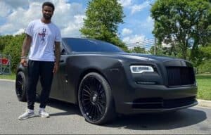Darius with his Royal Royce Wraith