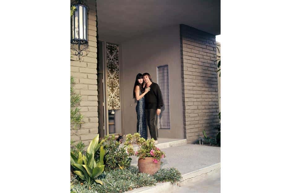 Sony and Cher in front of their first mansion