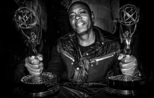 Chappelle showing his two Emmy Awards