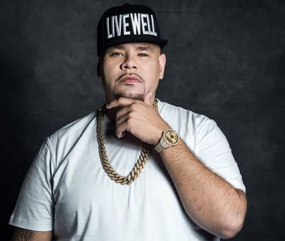 Fat Joe flexing his diamond coated watch & chain