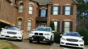 Wap's Cars parked in front of his house