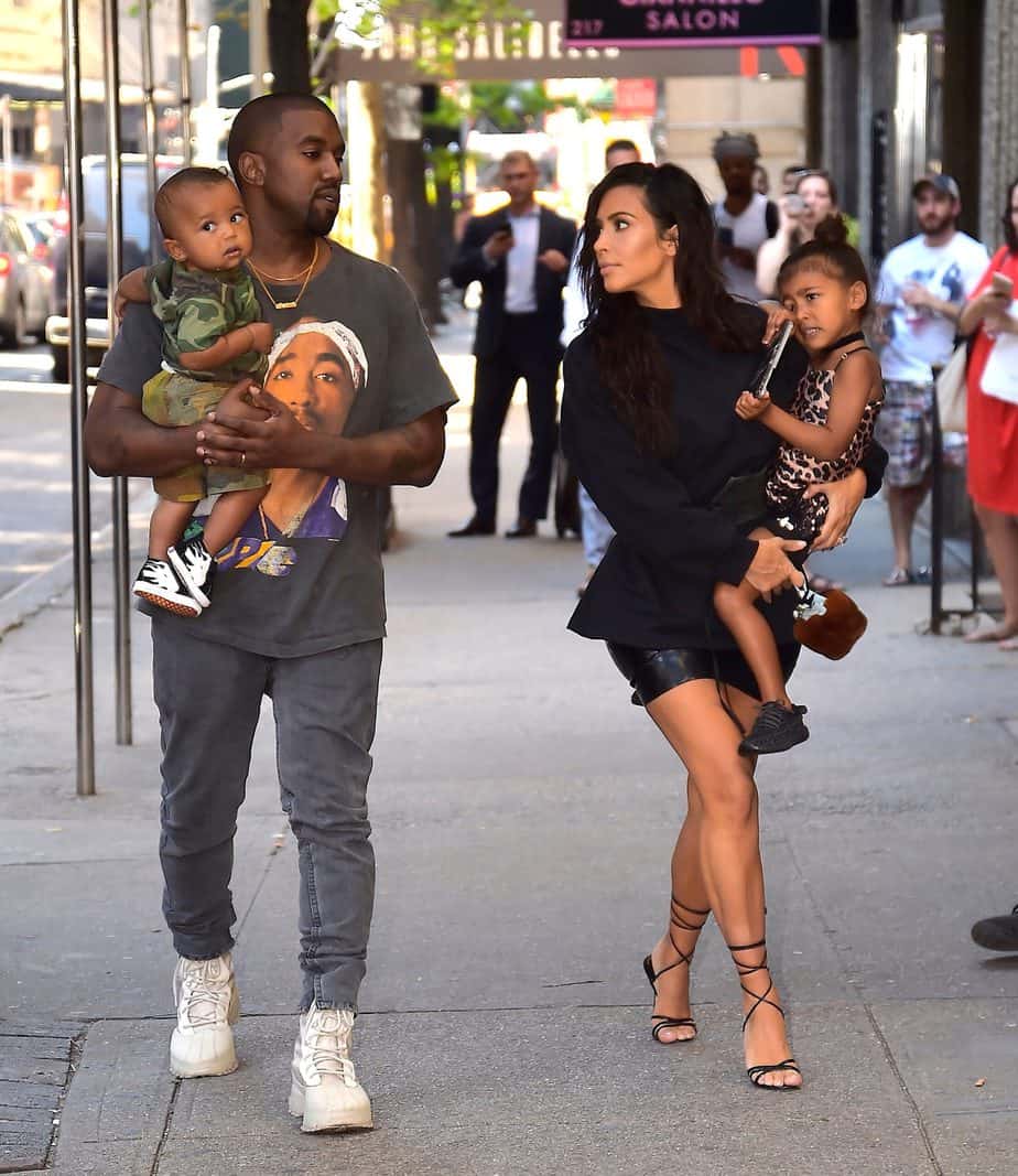 Kanye West And Kim Kardashian With Their Children Chicago & Psalm.