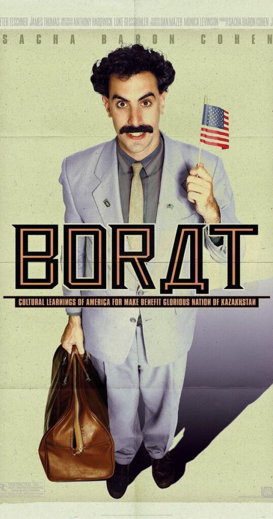 Borat Sagdiyev with Flag of USA and Bag in his hand
