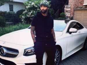Budden with his Mercedes Benz