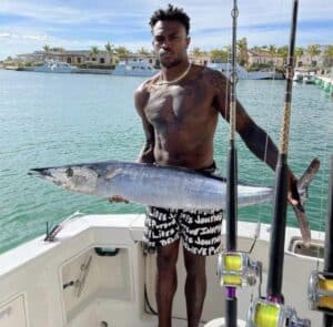 Jones showing the fish he caught in Punta Cana