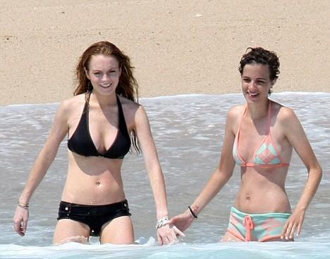 Lindsay Lohan on vacation with Samantha on the beach.