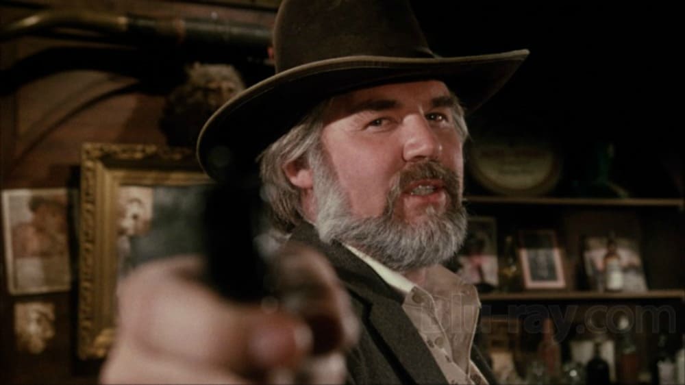 Kenny Rogers playing role as "The Gambler" on a movie.