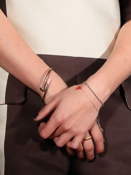 Kristen Stewart wearing Cartier jewelry.