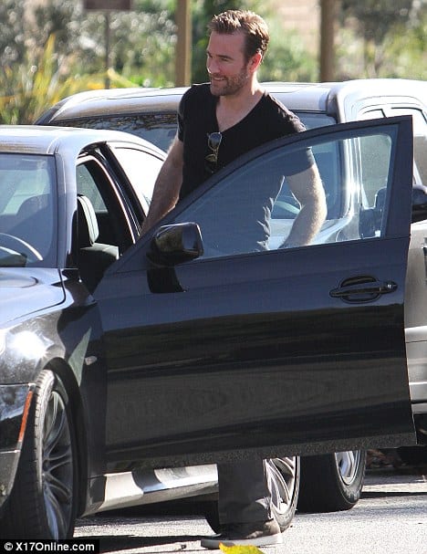 James Van Der Beek, photographed while taking his pregnant wife on a movie date in his dashing car.