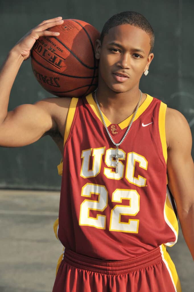Lil Romeo's photoshoot wearing the jersey of USC basketball team.