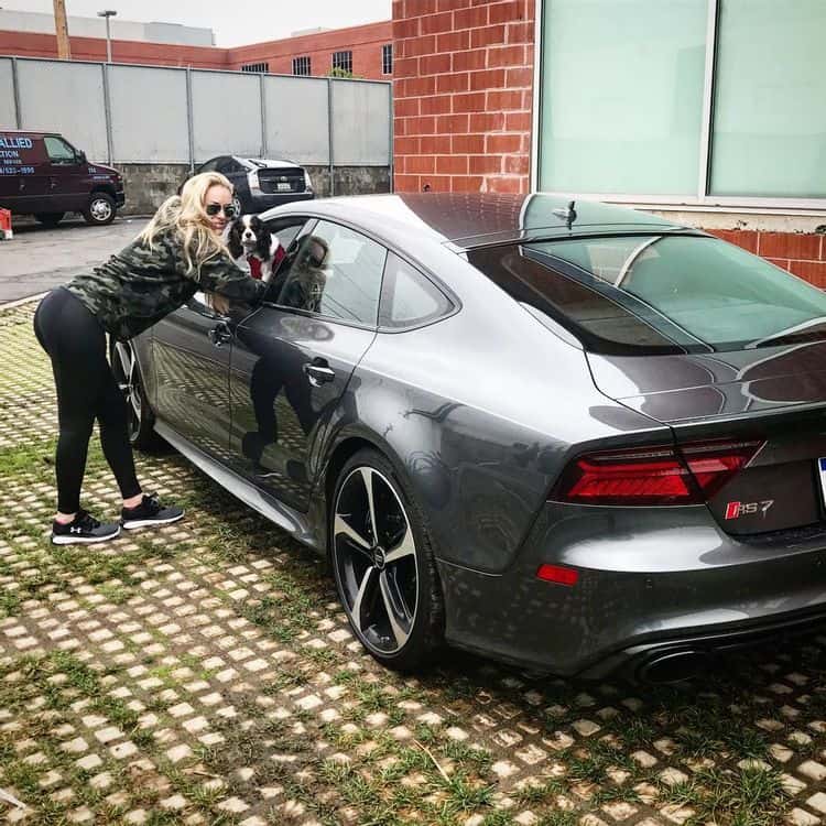 Lindsey Vonn with her puppy in her car, Audi RS7, while returning home from a gym.