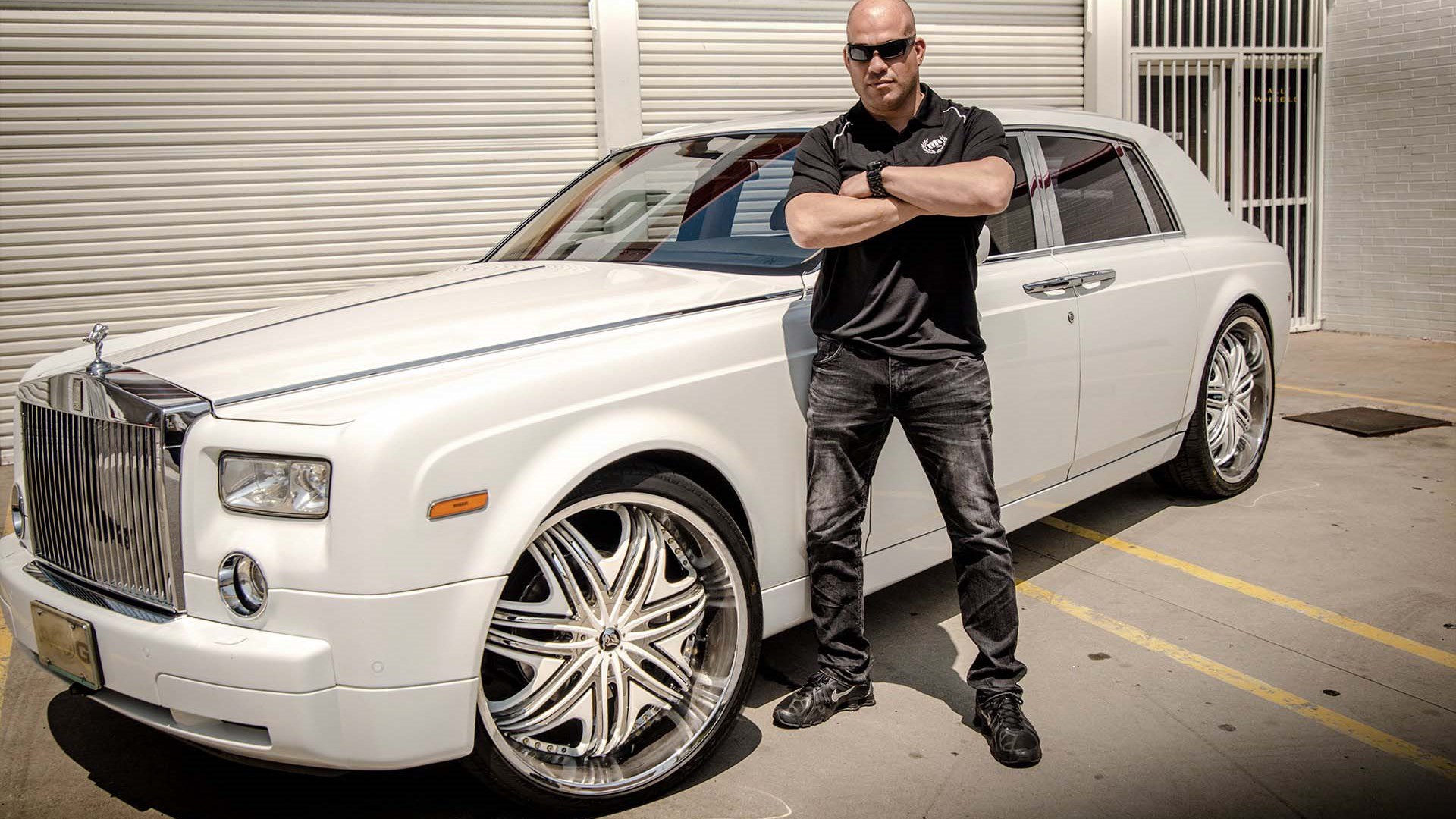 Tito with his elegant Rolls-Royce Phantom. (Source: Autotrader)