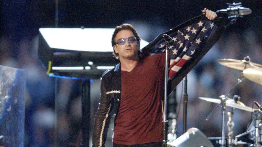 U2-Bono-Showing-American-Flagline-Jacket-In-2002-SuperBowl