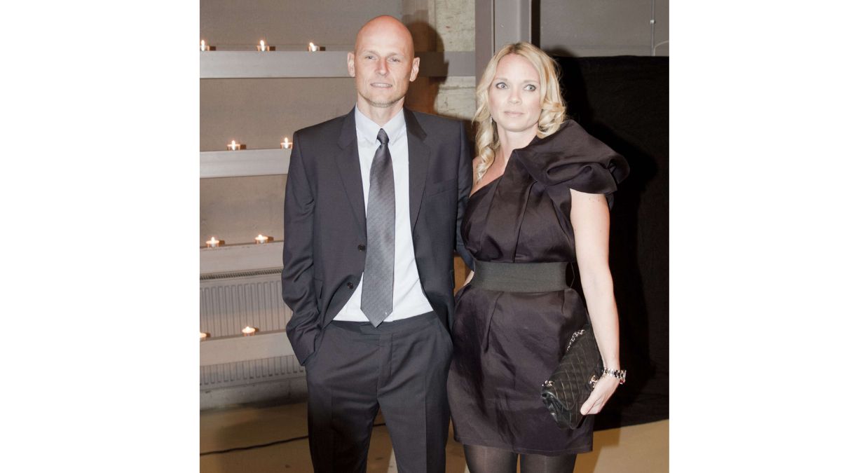 Ståle Solbakken posing with his wife at a formal event