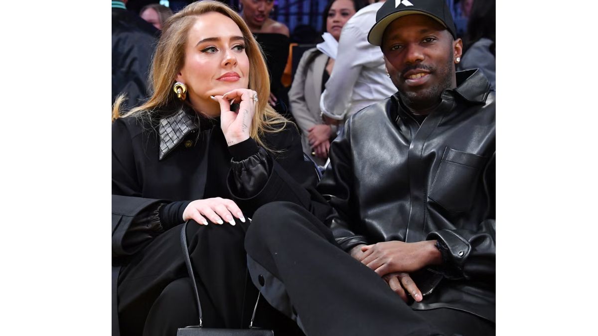 Adele and Rich Paul seated together at a basketball game